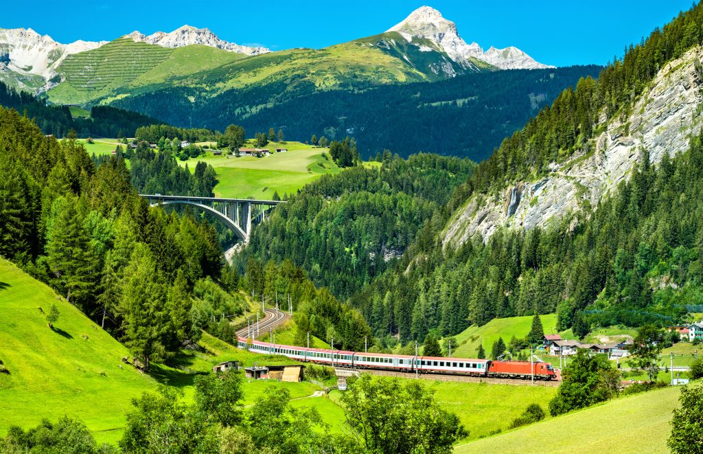 Passenger train at the Brenner Railway in the Austrian Alps